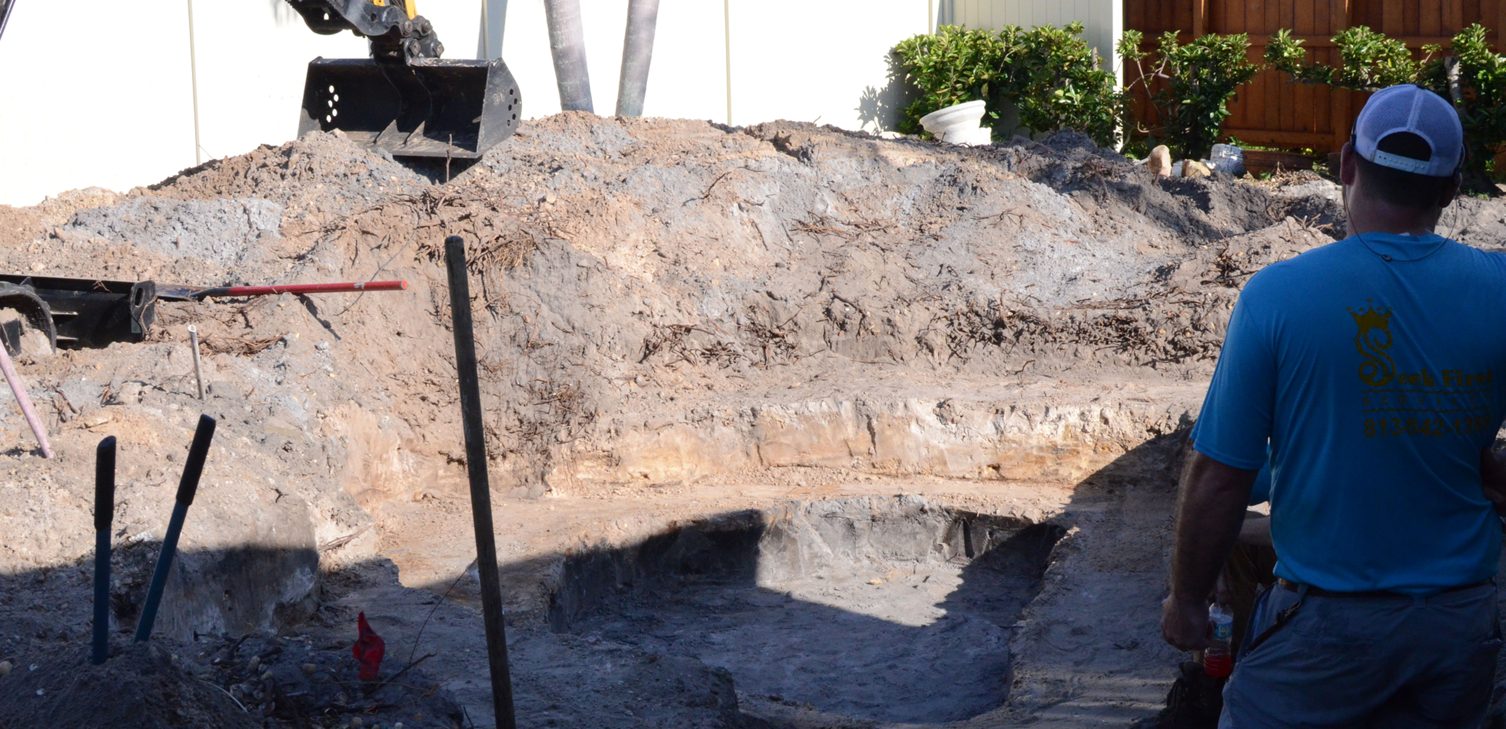 Beautifully lit backyard with landscape lighting features